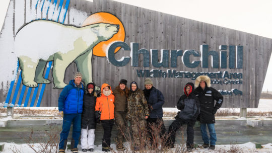 A Group Of Photographers Poses In Front Of The Churchill Wildlife Management Area