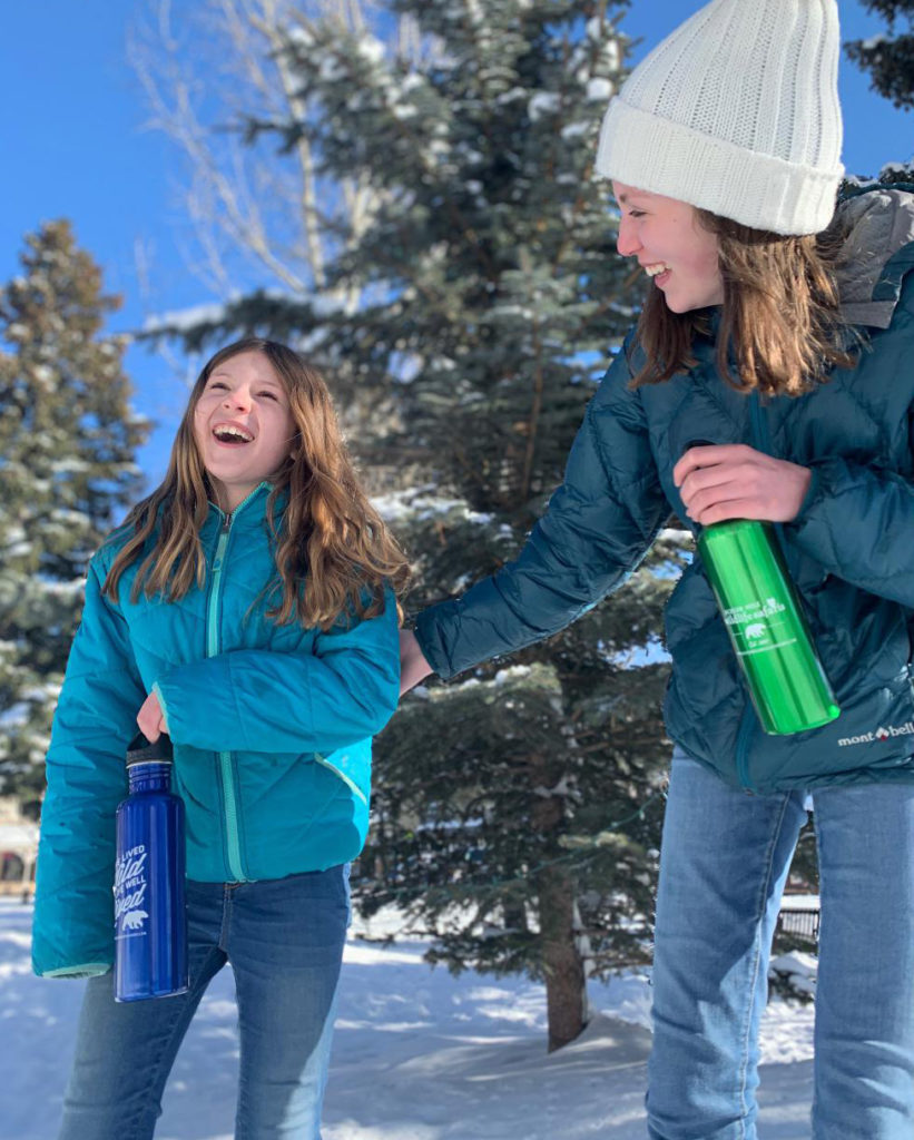 Sisters take their reusable water bottles on safari in Jackson Hole, Wyoming.