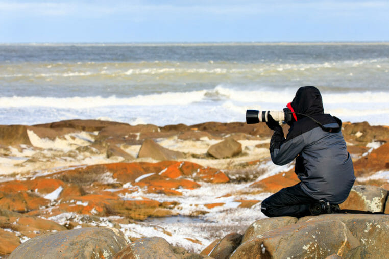 Photographer along the Hudson Bay near Churchill Manitoba.