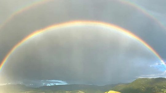 A Rare Full Double Rainbow Appears In The Sky Over The National Elk Refuge In Jackson Hole Wyoming