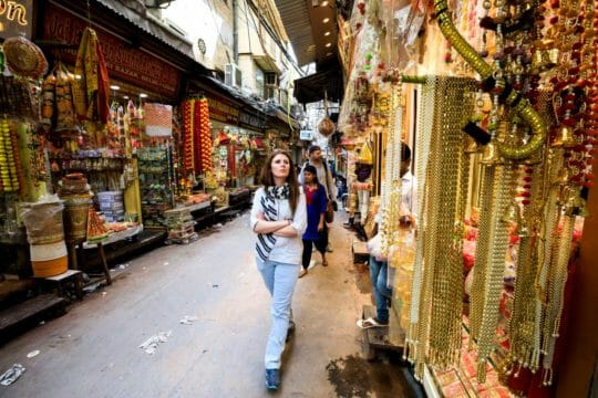 tourists walking through market