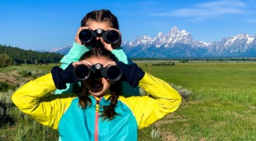 Kids Searching For Wildlife On A Jackson Hole Wildlife Safari Tour