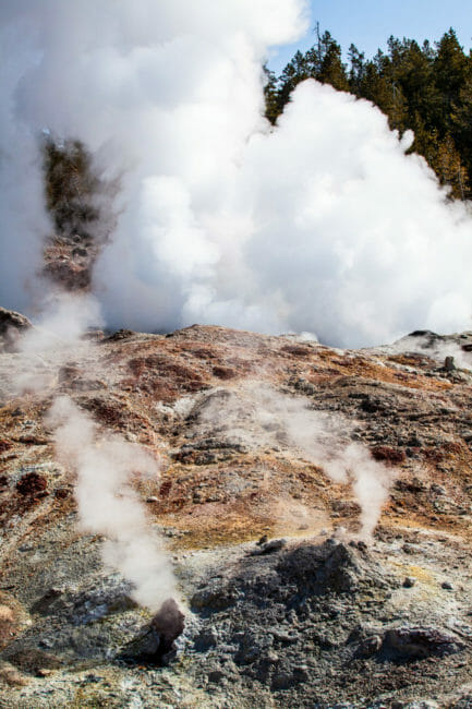 A Steaming Geothermal Feature In Yellowstone National Park