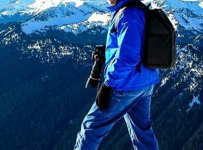 Dwight Vasel hiking up a mountain.