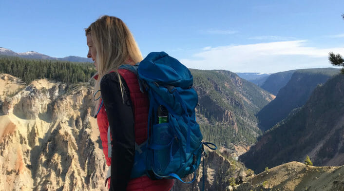 Professional Guide Ash Tallmadge Standing At An Overlook Of The Grand Canyon Of Yellowstone