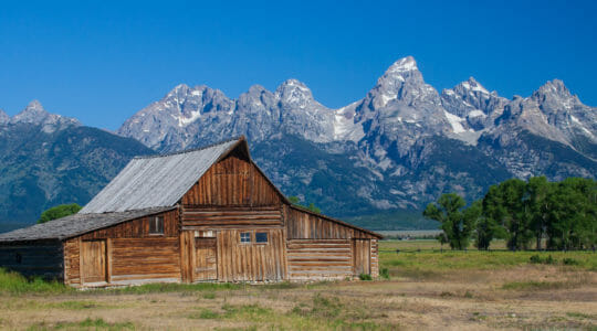 The Historic Moulton Barn Is Seen Against The Backdrop Of The Grand Teton Range in Jackson Hole Wyoming
