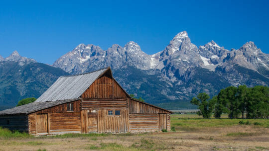 The Moulton Barn With The Grand Teton Range In The Background Is An Iconic Photograph Of A Jackson Hole Homestead