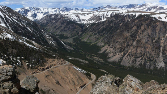 Distant Snow Capped Peaks Are Visible In A Panoramic View From High Altitude Along Dunraven Pass In Yellowstone National Park